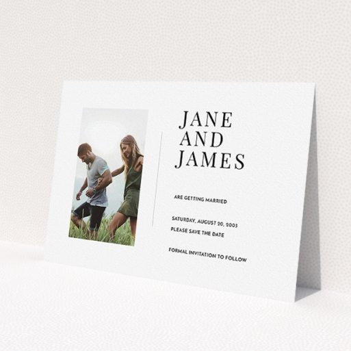 A wedding save the date card design called 'Modern postcard'. It is an A5 card in a landscape orientation. It is a photographic wedding save the date card with room for 1 photo. 'Modern postcard' is available as a flat card, with mainly white colouring.