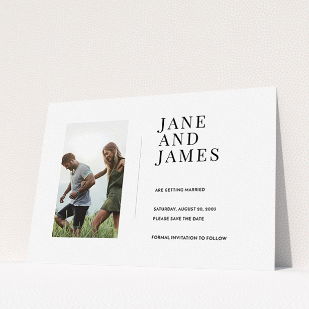 A wedding save the date card design called "Modern postcard". It is an A5 card in a landscape orientation. It is a photographic wedding save the date card with room for 1 photo. "Modern postcard" is available as a flat card, with mainly white colouring.