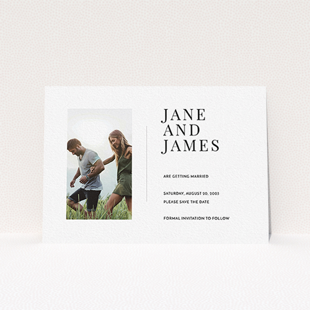 A wedding save the date card design named "Modern postcard". It is an A6 card in a landscape orientation. It is a photographic wedding save the date card with room for 1 photo. "Modern postcard" is available as a flat card, with mainly white colouring.