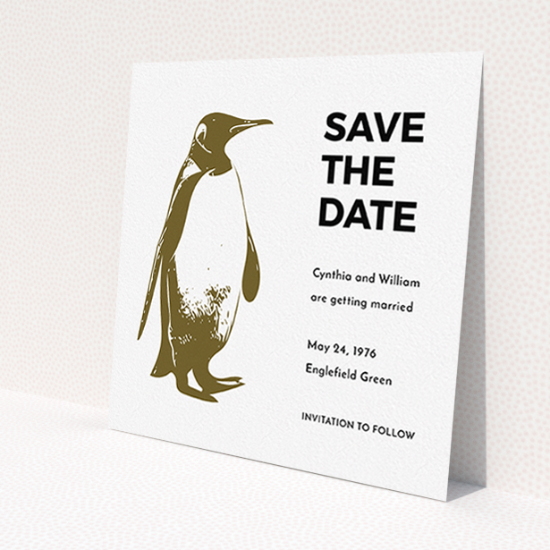 A wedding save the date card design called 'My little penguin'. It is a square (148mm x 148mm) card in a square orientation. 'My little penguin' is available as a flat card, with tones of dark gold and black.