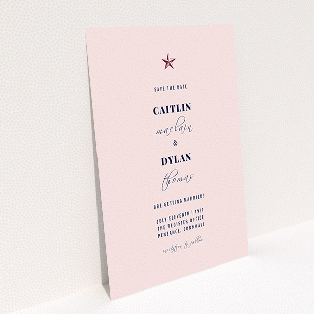 A wedding save the date card design titled "North Star". It is an A6 card in a portrait orientation. "North Star" is available as a flat card, with mainly pink colouring.