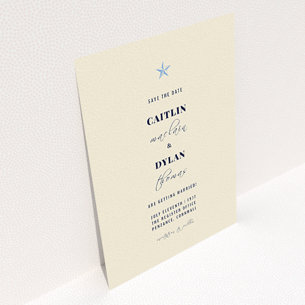 A wedding save the date card design named "North Star". It is an A6 card in a portrait orientation. "North Star" is available as a flat card, with mainly dark cream colouring.