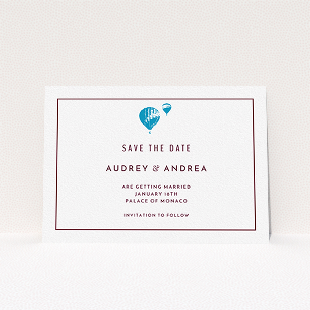 A wedding save the date card named "Off and away". It is an A6 card in a landscape orientation. "Off and away" is available as a flat card, with tones of white and blue.