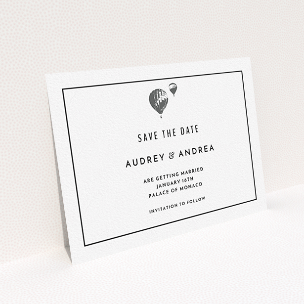 A wedding save the date card design named "Off and away". It is an A6 card in a landscape orientation. "Off and away" is available as a flat card, with mainly white colouring.