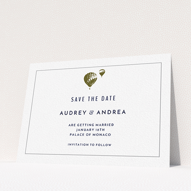 A wedding save the date card called "Off and away". It is an A6 card in a landscape orientation. "Off and away" is available as a flat card, with mainly white colouring.