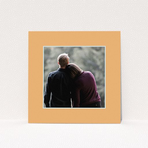 A wedding save the date card named "Orange Mint Photo Frame". It is a square (148mm x 148mm) card in a square orientation. It is a photographic wedding save the date card with room for 1 photo. "Orange Mint Photo Frame" is available as a flat card, with tones of orange and blue.