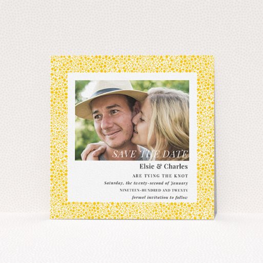 A wedding save the date card design called "Pastel flower border". It is a square (148mm x 148mm) card in a square orientation. It is a photographic wedding save the date card with room for 1 photo. "Pastel flower border" is available as a flat card, with tones of yellow and white.