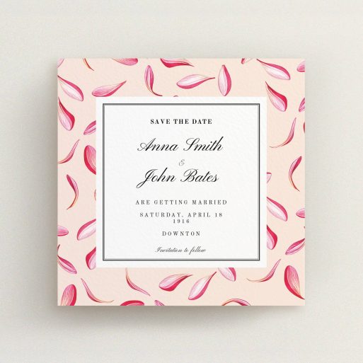 A wedding save the date card named "Petal avalanche". It is a square (148mm x 148mm) card in a square orientation. "Petal avalanche" is available as a flat card, with tones of pink, red and white.