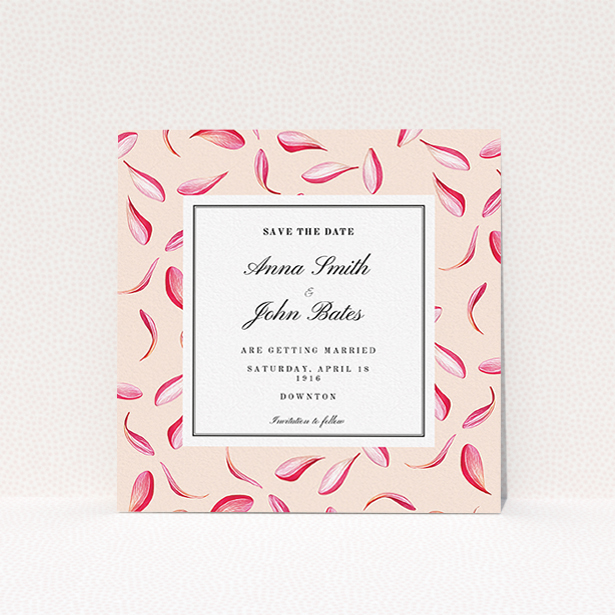 A wedding save the date card named "Petal avalanche". It is a square (148mm x 148mm) card in a square orientation. "Petal avalanche" is available as a flat card, with tones of pink, red and white.