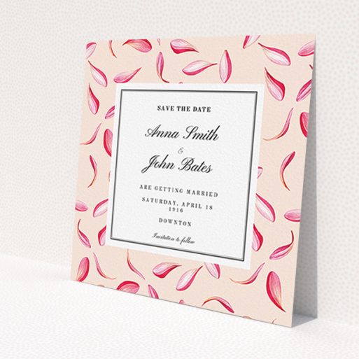 A wedding save the date card named 'Petal avalanche'. It is a square (148mm x 148mm) card in a square orientation. 'Petal avalanche' is available as a flat card, with tones of pink, red and white.