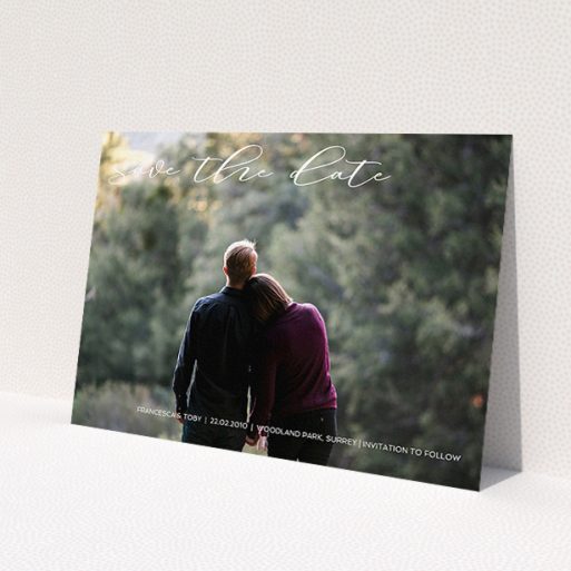 A wedding save the date card called 'Photo Freedom'. It is an A5 card in a landscape orientation. It is a photographic wedding save the date card with room for 1 photo. 'Photo Freedom' is available as a flat card, with mainly white colouring.