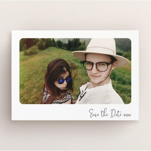 A wedding save the date card called "Rounded Landscape Photo". It is an A5 card in a landscape orientation. It is a photographic wedding save the date card with room for 1 photo. "Rounded Landscape Photo" is available as a flat card, with mainly white colouring.
