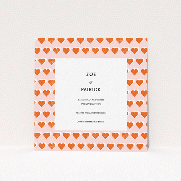 A wedding save the date card called "Rustic Hearts". It is a square (148mm x 148mm) card in a square orientation. "Rustic Hearts" is available as a flat card, with tones of pink and orange.
