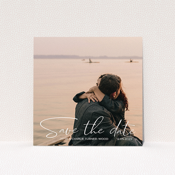 A wedding save the date card design called "Salamanca". It is a square (148mm x 148mm) card in a square orientation. It is a photographic wedding save the date card with room for 1 photo. "Salamanca" is available as a flat card, with mainly white colouring.