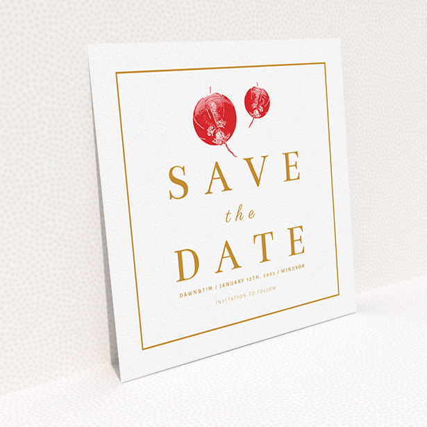A wedding save the date card design titled "Shanghai Nights". It is a square (148mm x 148mm) card in a square orientation. "Shanghai Nights" is available as a flat card, with tones of orange and white.