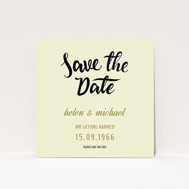 A wedding save the date card named "Simply Black Typography Pen". It is a square (148mm x 148mm) card in a square orientation. "Simply Black Typography Pen" is available as a flat card, with tones of cream, gold and black.