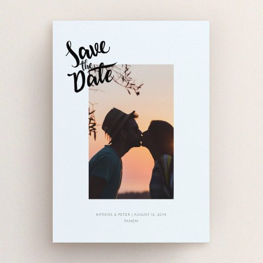 A wedding save the date card design titled "Stamp Typography". It is an A5 card in a portrait orientation. It is a photographic wedding save the date card with room for 1 photo. "Stamp Typography" is available as a flat card, with mainly light blue colouring.