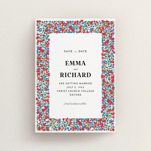 A wedding save the date card called "Summer from a distance". It is an A6 card in a portrait orientation. "Summer from a distance" is available as a flat card, with tones of white and red.