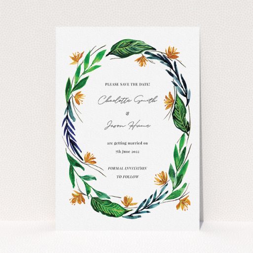 A wedding save the date card named "Summer Whirl Wreath". It is an A5 card in a portrait orientation. "Summer Whirl Wreath" is available as a flat card, with tones of green, dark blue and orange.