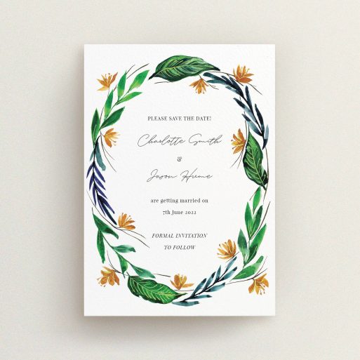 A wedding save the date card design named "Summer Whirl Wreath". It is an A6 card in a portrait orientation. "Summer Whirl Wreath" is available as a flat card, with tones of green, dark blue and orange.