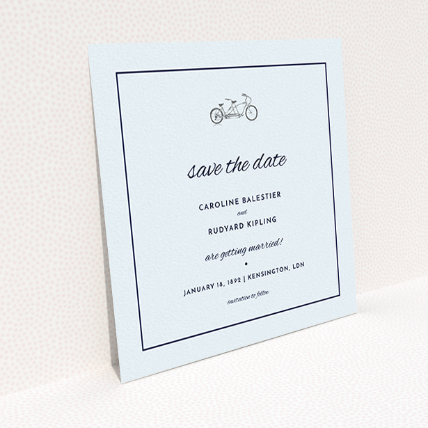A wedding save the date card design called "Tandem sheet". It is a square (148mm x 148mm) card in a square orientation. "Tandem sheet" is available as a flat card, with tones of light blue and light grey.