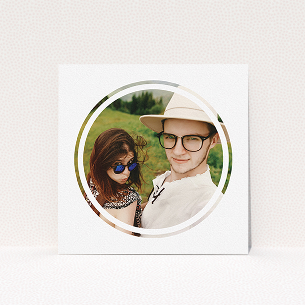 A wedding save the date card named "Target practice". It is a square (148mm x 148mm) card in a square orientation. It is a photographic wedding save the date card with room for 1 photo. "Target practice" is available as a flat card, with mainly white colouring.