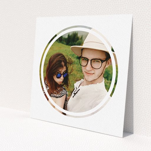 A wedding save the date card named 'Target practice'. It is a square (148mm x 148mm) card in a square orientation. It is a photographic wedding save the date card with room for 1 photo. 'Target practice' is available as a flat card, with mainly white colouring.