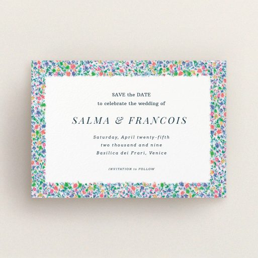 A wedding save the date card called "The faraway garden". It is an A6 card in a landscape orientation. "The faraway garden" is available as a flat card, with tones of white, blue and green.