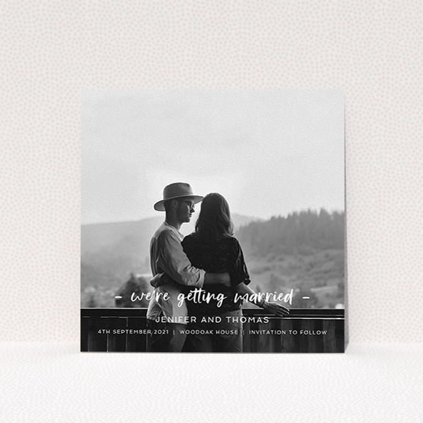 A wedding save the date card named "To the Point". It is a square (148mm x 148mm) card in a square orientation. It is a photographic wedding save the date card with room for 1 photo. "To the Point" is available as a flat card, with mainly white colouring.