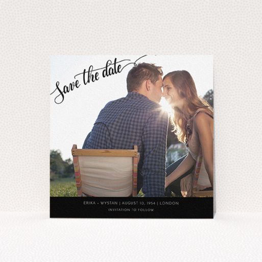 A wedding save the date card called "Typography Corner". It is a square (148mm x 148mm) card in a square orientation. It is a photographic wedding save the date card with room for 1 photo. "Typography Corner" is available as a flat card, with tones of black and white.