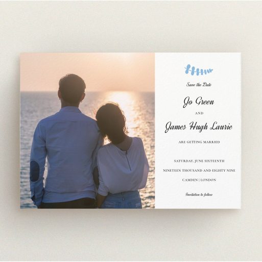 A wedding save the date card design named "Us and blossom". It is an A5 card in a landscape orientation. It is a photographic wedding save the date card with room for 1 photo. "Us and blossom" is available as a flat card, with tones of white and blue.