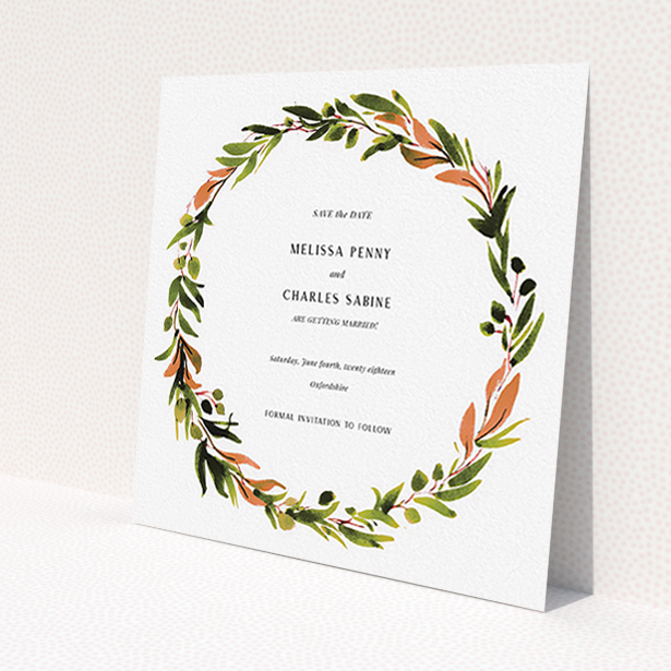 A wedding save the date card called "Watercolour Olive Wreath". It is a square (148mm x 148mm) card in a square orientation. "Watercolour Olive Wreath" is available as a flat card, with tones of green, dark green and terracotta.