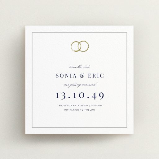 A wedding save the date card design titled "Wedding bands". It is a square (148mm x 148mm) card in a square orientation. "Wedding bands" is available as a flat card, with tones of white and gold.