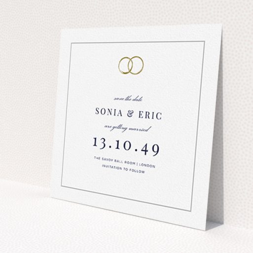 A wedding save the date card design titled 'Wedding bands'. It is a square (148mm x 148mm) card in a square orientation. 'Wedding bands' is available as a flat card, with tones of white and gold.
