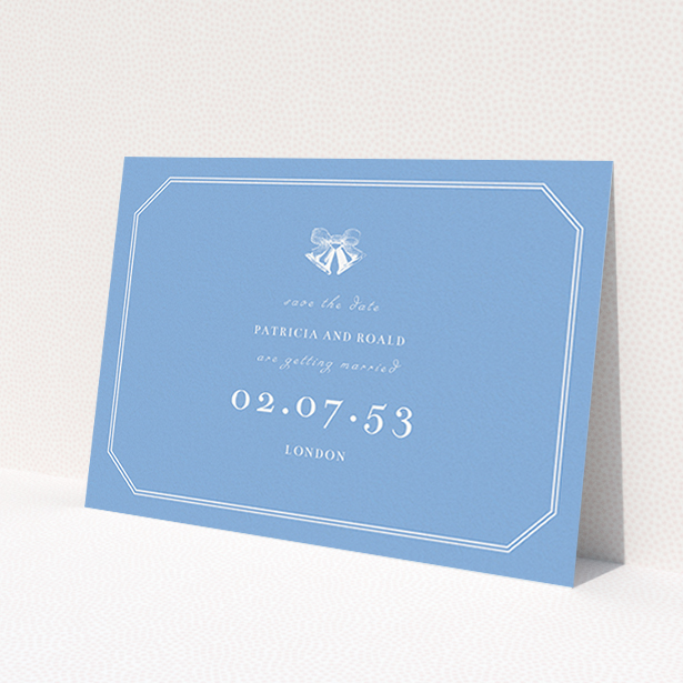 A wedding save the date card named "Wedding bells". It is an A6 card in a landscape orientation. "Wedding bells" is available as a flat card, with tones of blue and white.