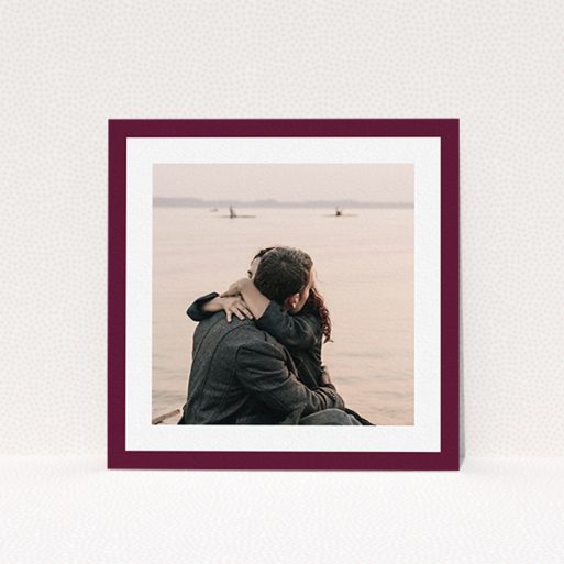 A wedding save the date template titled "Classic Burgundy Photo Frame". It is a square (148mm x 148mm) save the date in a square orientation. It is a photographic wedding save the date with room for 1 photo. "Classic Burgundy Photo Frame" is available as a flat save the date, with tones of burgundy and white.