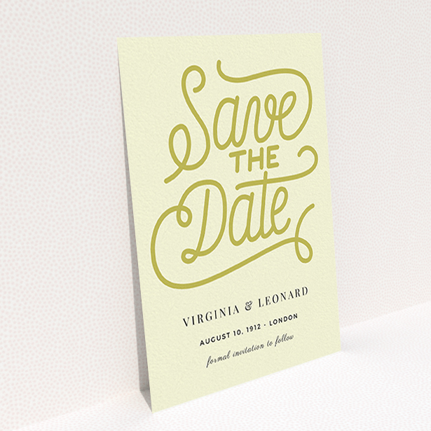 A wedding save the date named "Gold on Cream Typography". It is an A6 save the date in a portrait orientation. "Gold on Cream Typography" is available as a flat save the date, with tones of cream and gold.
