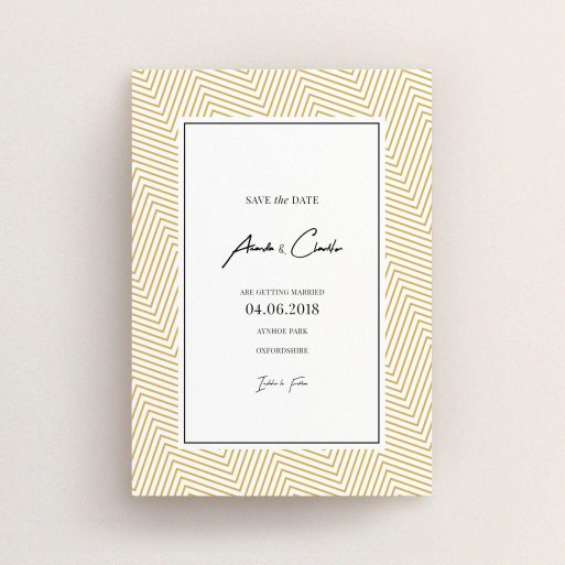 A wedding save the date named "Golden Lines". It is an A6 save the date in a portrait orientation. "Golden Lines" is available as a flat save the date, with tones of gold and white.