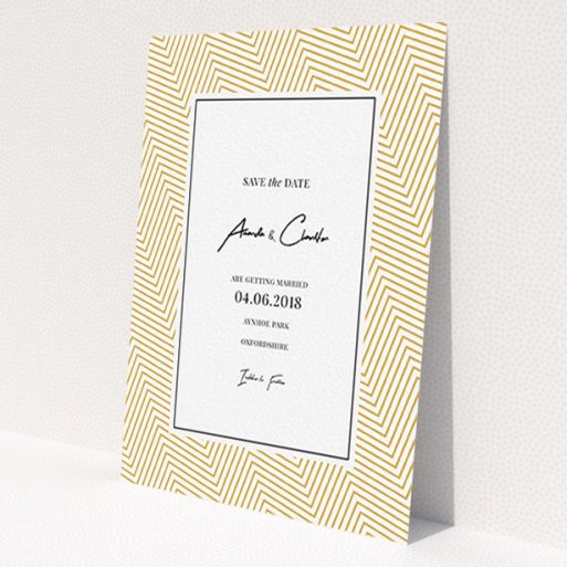 A wedding save the date named 'Golden Lines'. It is an A6 save the date in a portrait orientation. 'Golden Lines' is available as a flat save the date, with tones of gold and white.