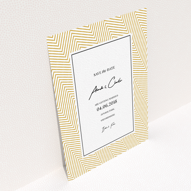 A wedding save the date named "Golden Lines". It is an A6 save the date in a portrait orientation. "Golden Lines" is available as a flat save the date, with tones of gold and white.