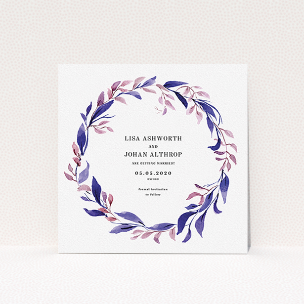 A wedding save the date design called "Hues of Blue". It is a square (148mm x 148mm) save the date in a square orientation. "Hues of Blue" is available as a flat save the date, with mainly purple/dark pink colouring.