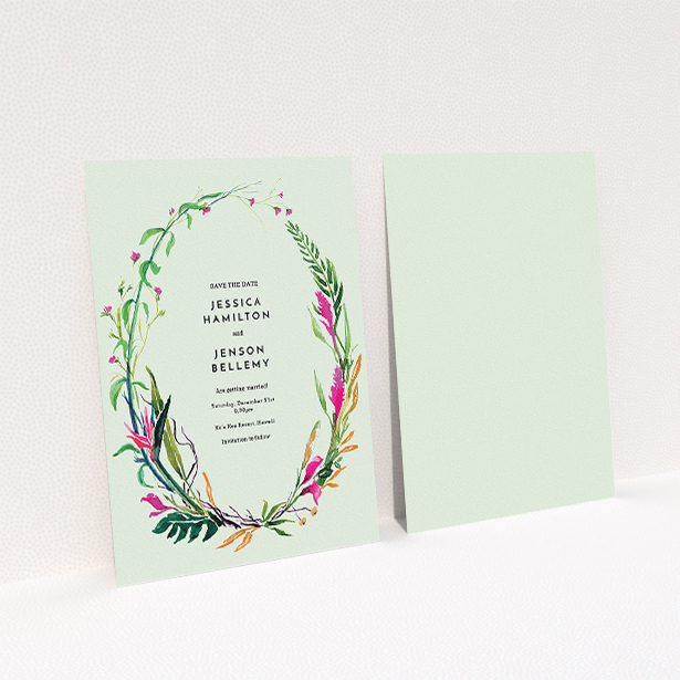 A wedding save the date called "Jungle collection". It is an A5 save the date in a portrait orientation. "Jungle collection" is available as a flat save the date, with tones of green, pink and orange.