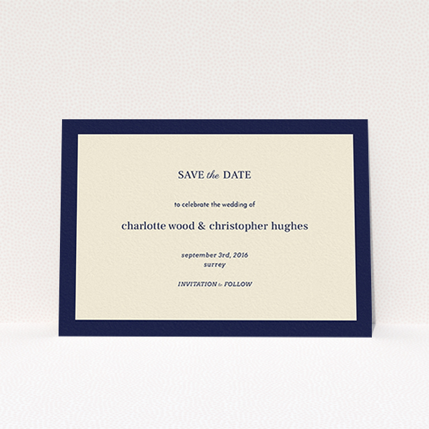 A wedding save the date called "Laydown simple". It is an A6 save the date in a landscape orientation. "Laydown simple" is available as a flat save the date, with tones of navy blue and cream.