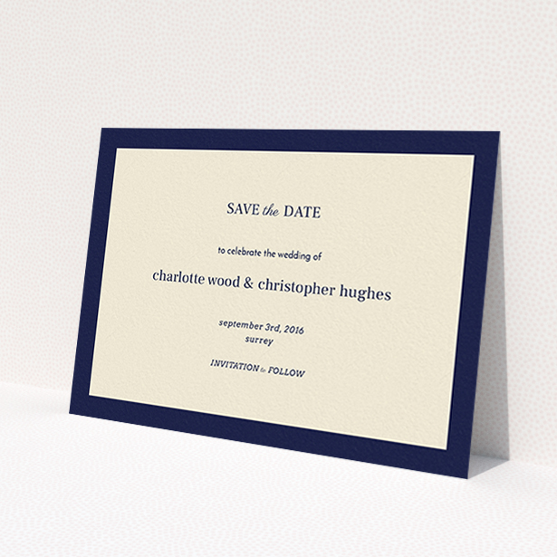 A wedding save the date called "Laydown simple". It is an A6 save the date in a landscape orientation. "Laydown simple" is available as a flat save the date, with tones of navy blue and cream.