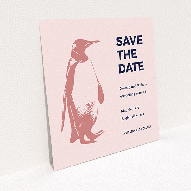 A wedding save the date design named "My little penguin". It is a square (148mm x 148mm) save the date in a square orientation. "My little penguin" is available as a flat save the date, with tones of navy blue and pink.