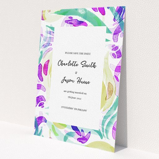 A wedding save the date design called 'Neon Florals'. It is an A6 save the date in a portrait orientation. 'Neon Florals' is available as a flat save the date, with tones of white and green.