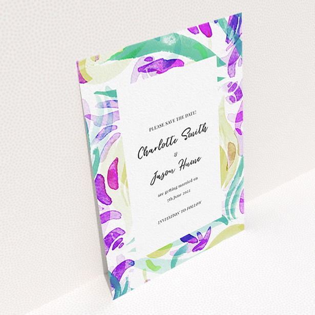 A wedding save the date design called "Neon Florals". It is an A6 save the date in a portrait orientation. "Neon Florals" is available as a flat save the date, with tones of white and green.