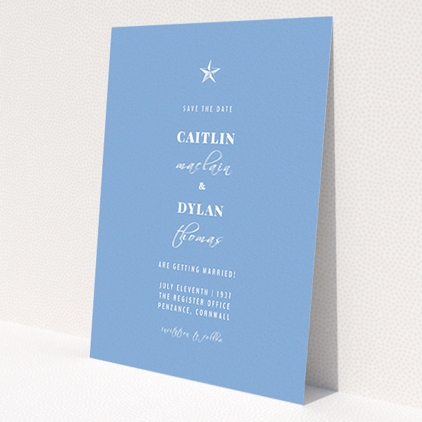 A wedding save the date design called 'North Star'. It is an A6 save the date in a portrait orientation. 'North Star' is available as a flat save the date, with tones of blue and white.