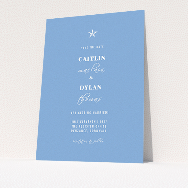 A wedding save the date design called "North Star". It is an A6 save the date in a portrait orientation. "North Star" is available as a flat save the date, with tones of blue and white.