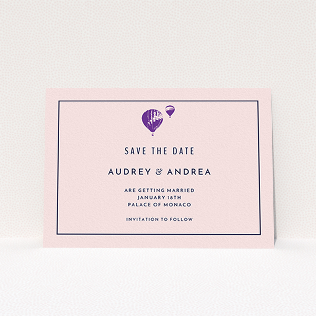 A wedding save the date called "Off and away". It is an A6 save the date in a landscape orientation. "Off and away" is available as a flat save the date, with tones of pink, purple and midnight blue.